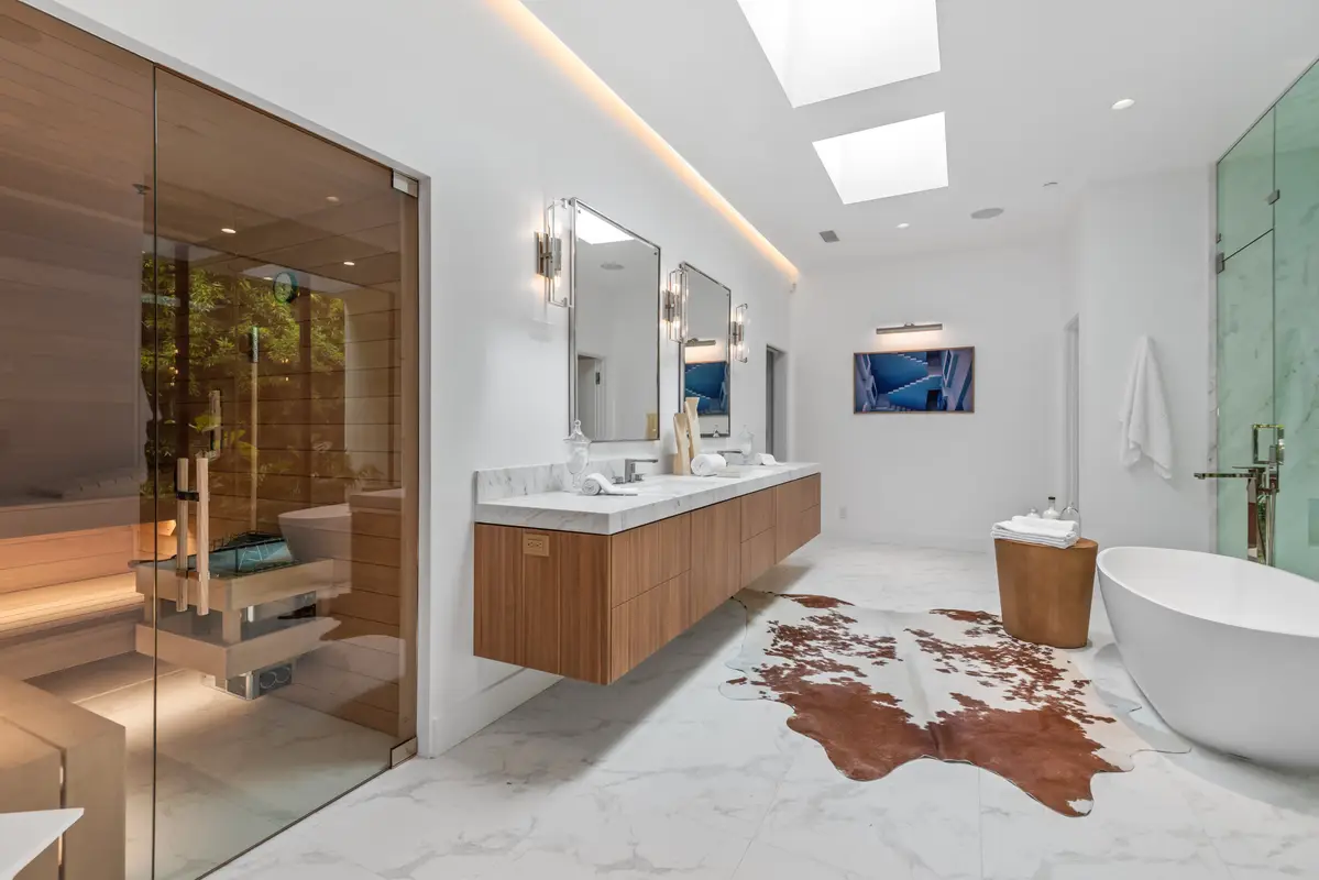 White, modern bathroom with a sauna